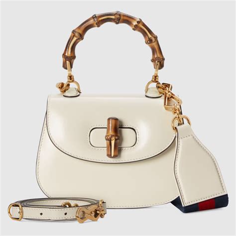 mini bamboo bucket bag with chain gucci|gucci monogram bamboo handle bag.